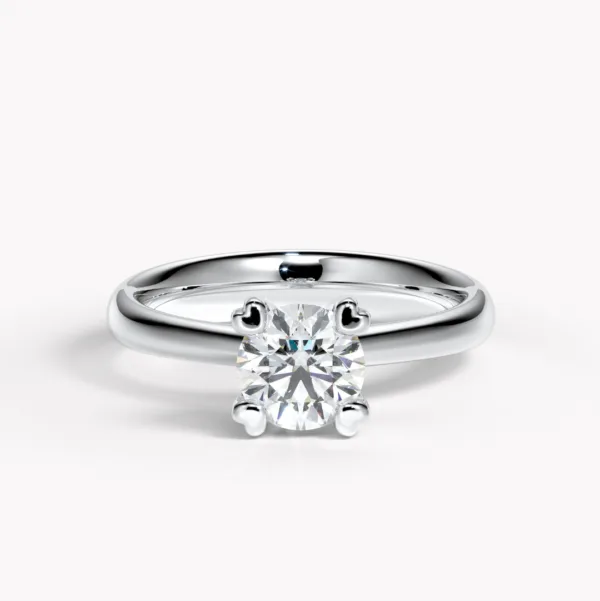 ring i vitguld hjärtan