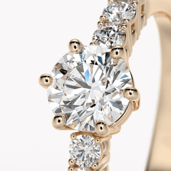 ring med briljantslipad diamant i rödguld