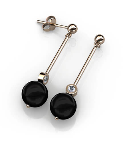 örhängen i roséguld med diamanter och onyx