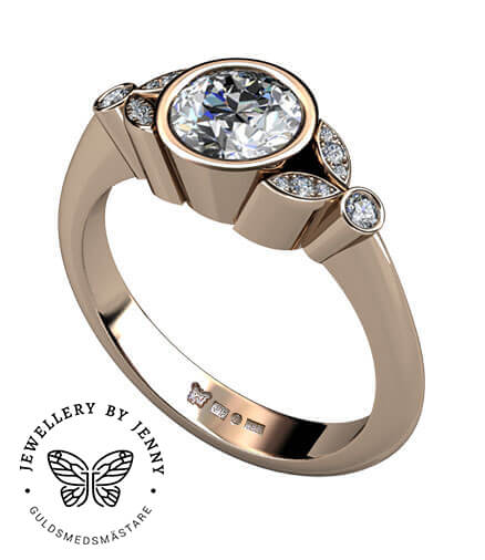 förlovningsring i rödguld med diamanter